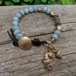 Aquamarine, Labradorite artisan bracelet with seahorse, seashell charms. Boho bracelet. Bohemian jewelry. Handcrafted by Aurora Creative Jewellery.
