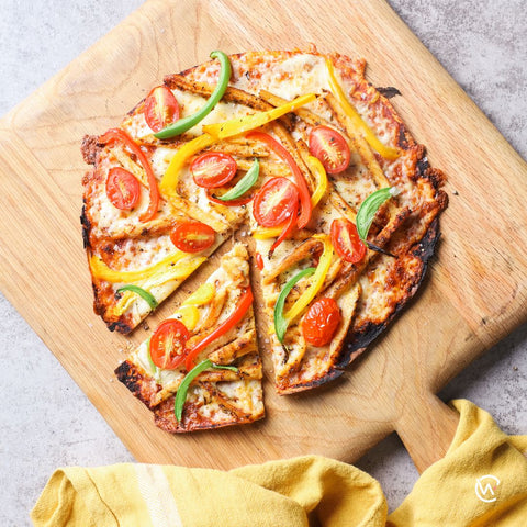 Paprika chicken, peppers and tomato pizza with wrap base