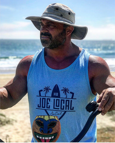 Joe Local SoCal Tank Top Neon Blue or Sky blue with navy Blue SoCal/HB shield Logo 50:50 Cotton / Polyester blend 4.8 oz / 165 gram Joe Local SoCal/HB shield Logo on front Joe Local Logo on back.