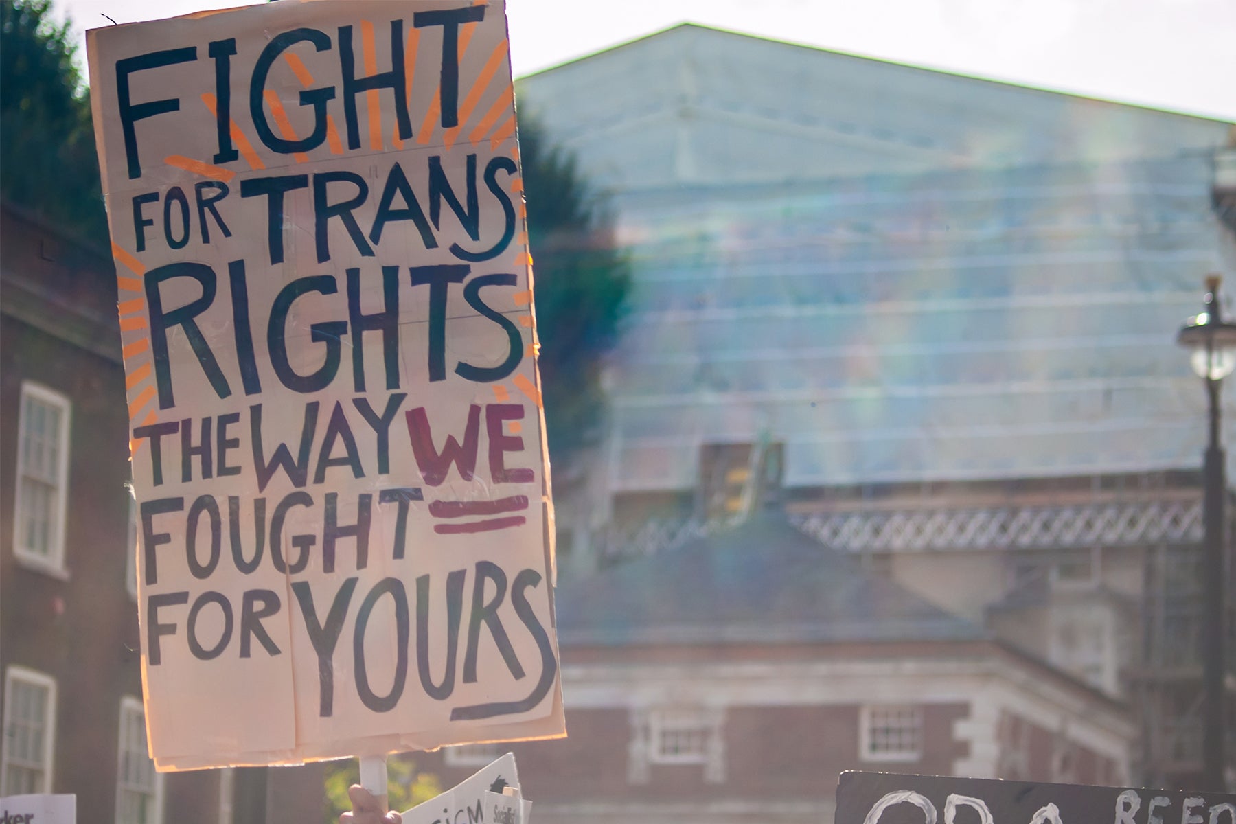 Protest sign reading 'Fight for Trans Rights the Way We Fought For Yours'