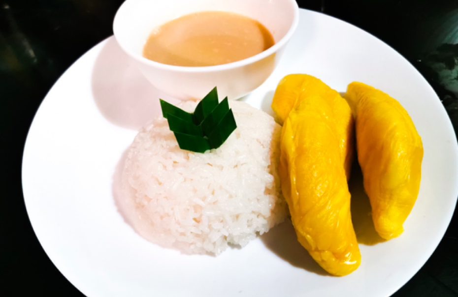 Sticky rice served with durian and santan or coconut milk