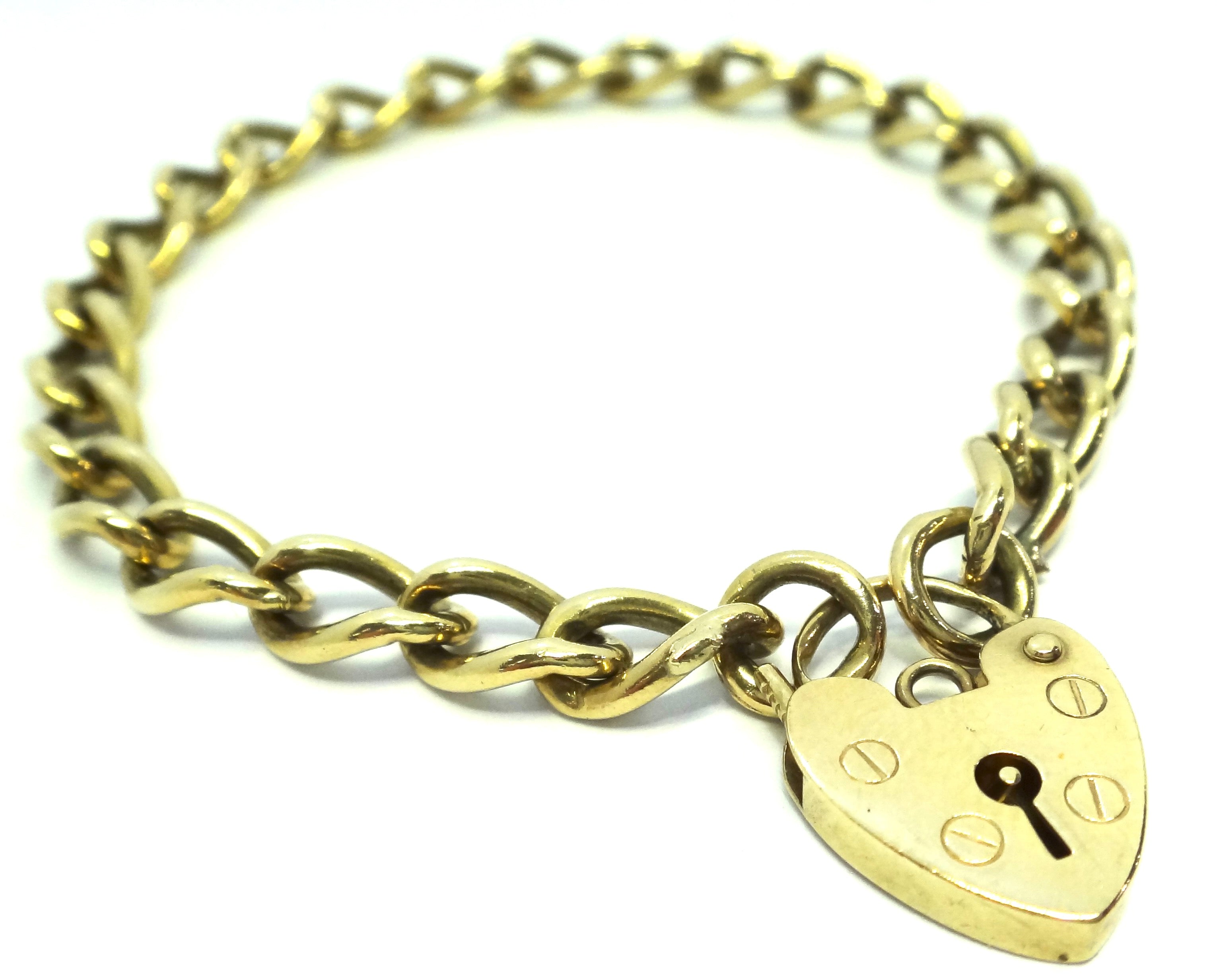 gold bracelet with heart locket