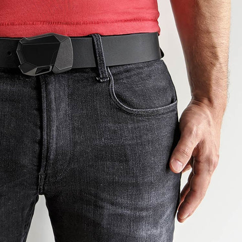 Person dressed in dark jeans, red shirt, and matte black buckle on black belt.