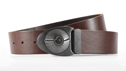 turn the center of the dial belt buckle to unlock your belt