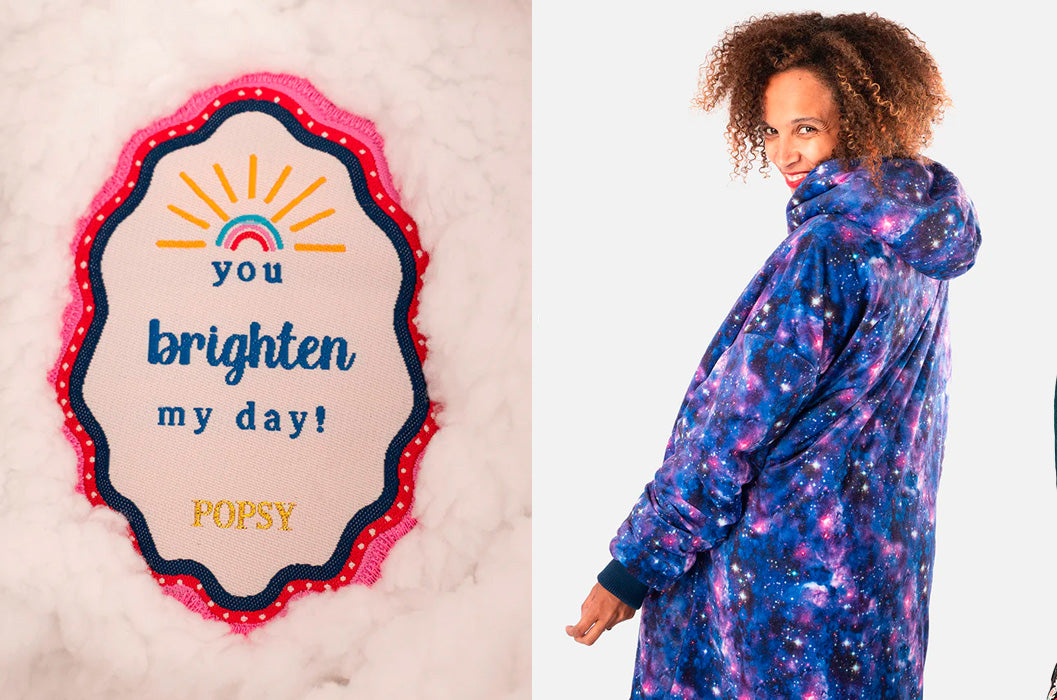 A tag with "brighten my day" text on the left side and a woman wear a galaxy jumper popsy pop on on the right