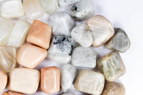 varieties of moonstone, pink moonstone, blue moonstone, black moonstone, white moonstone, healing crystals, tumbled