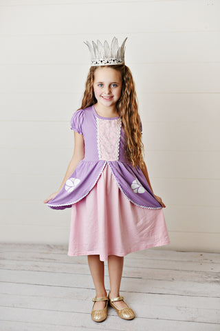 Girl wearing princess dress and crown