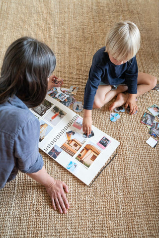 Mother and son scrapbooking together