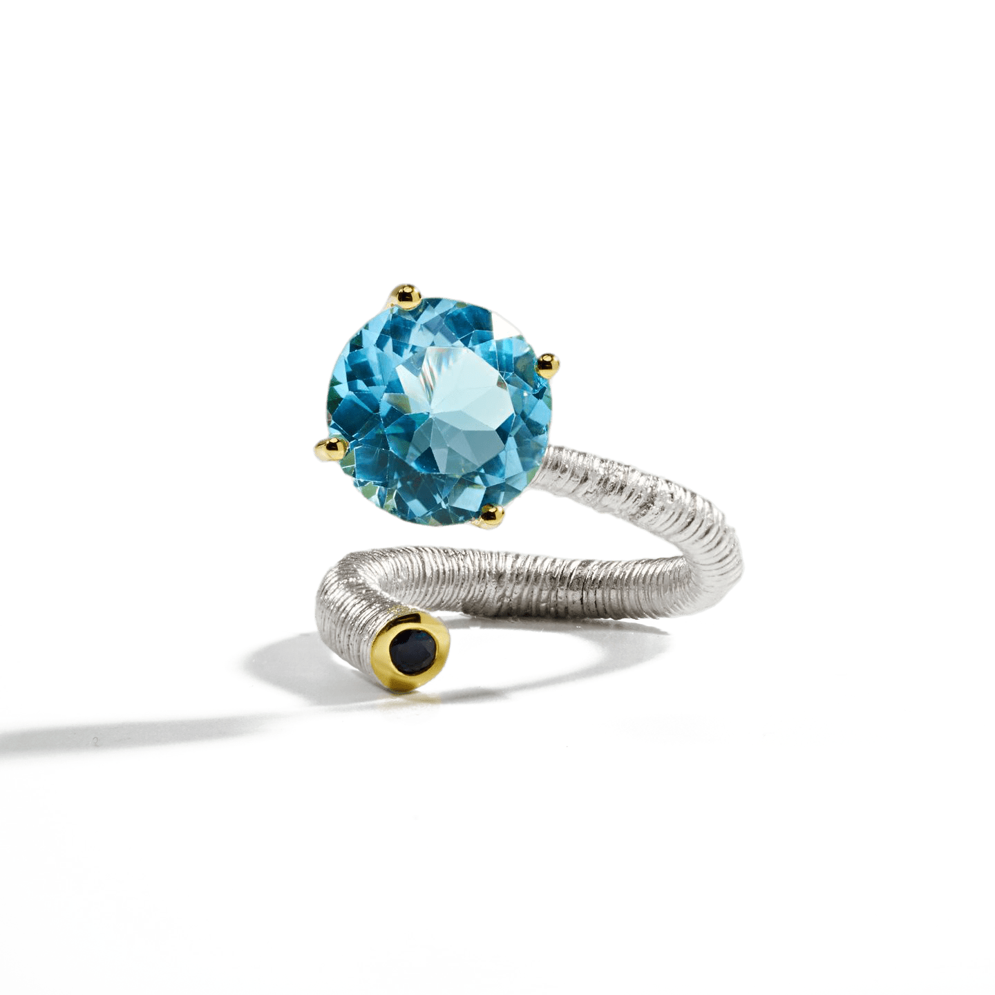 Image of Nagas Topaz and Sapphire Ring