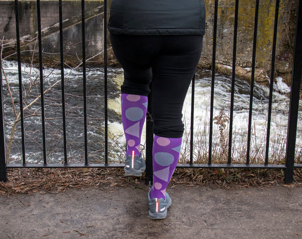 marathon runner and athlete wearing Odd Duck compression socks