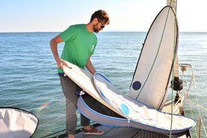 Sails into board bags | Source: Into Blue and Green