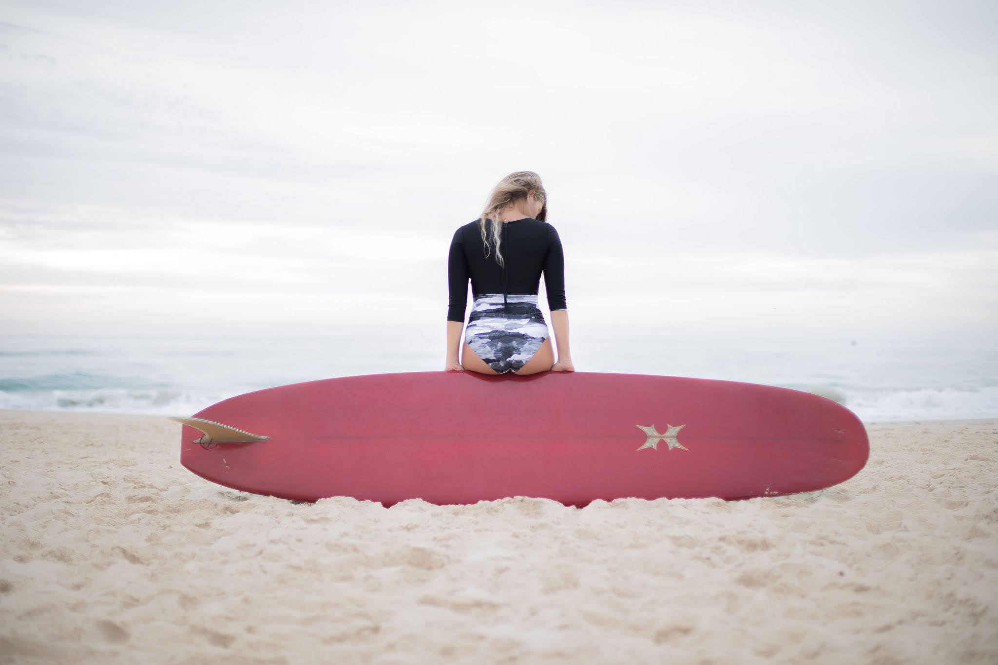 Macarena wearing Medewi one-piece in storm print