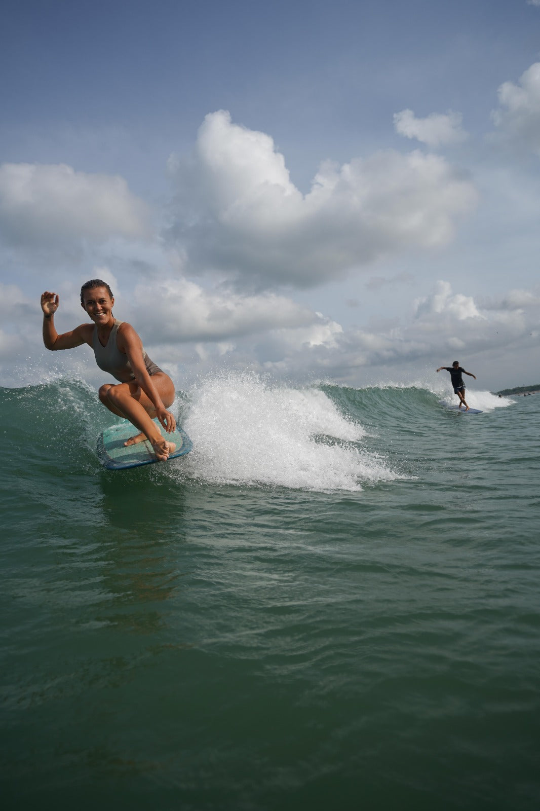 ninefootstudio muse Dana is enjoying her nose ride in Ulu during sunny day