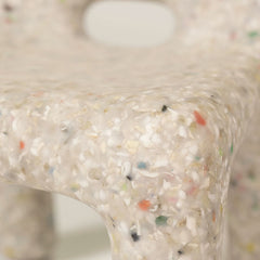 Closeup of Charlie Chair in the colour Off-White, made of recycled plastic