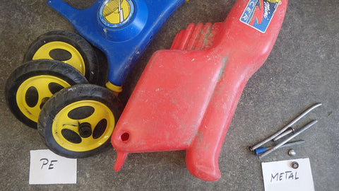 A push motorbike for children made out of plastic