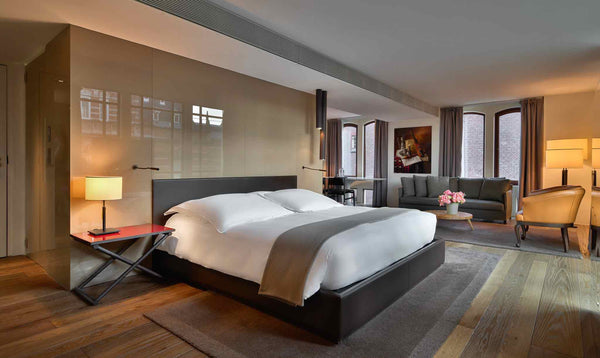Conservatorium Hotel Bedroom with luxury merino blankets made in England