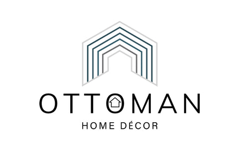 A hexagon with the bottom 2 sides missing, mirroring the shape of a roof.  THe words below: Ottoman Home Décor