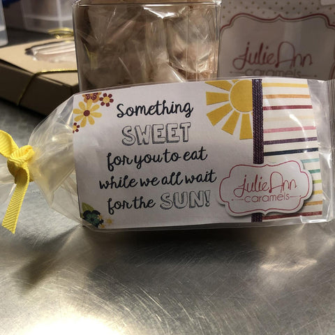 Wrapped caramels with tag that reads Something Sweet For You To Eat While We All Wait For The Sun