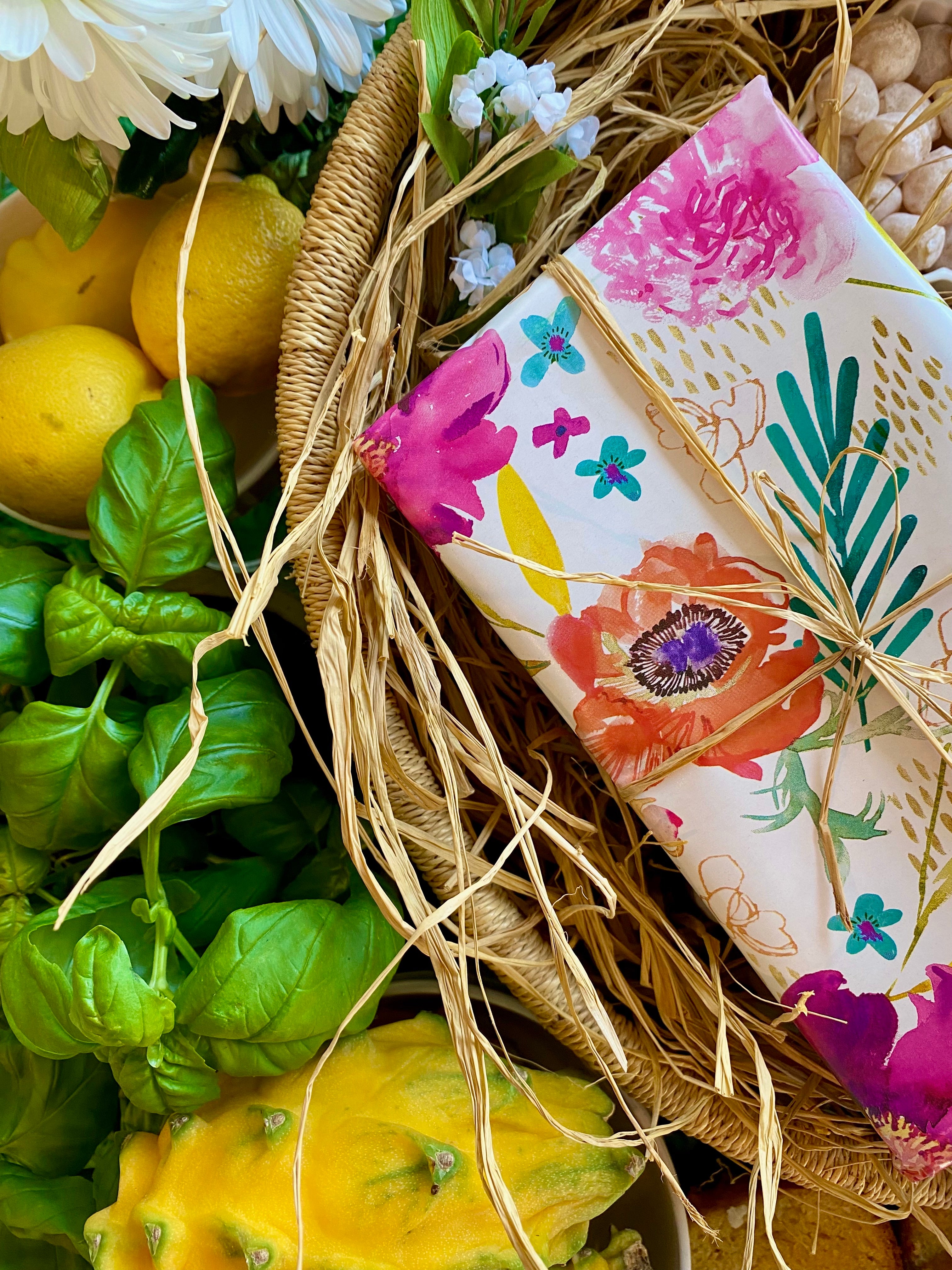 Easter gift in basket wrapped in raffia