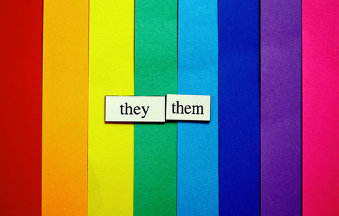 rainbow background and the words 'they' and 'them'