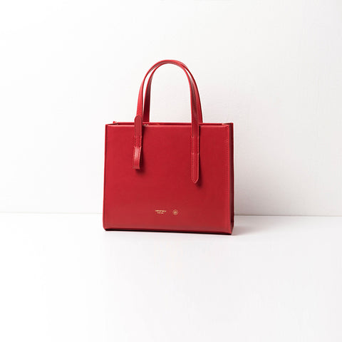 red leather luggage