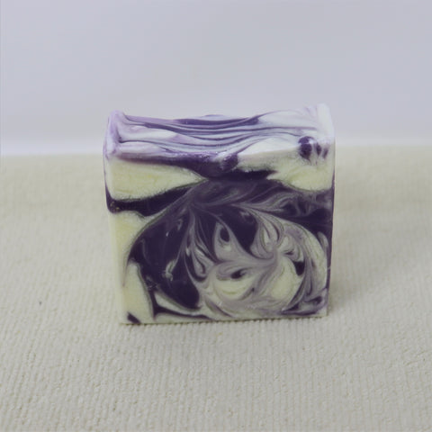 By the Sea Soap Shoppe soap called "Lilac and Lilies". White with swirls in different shade of purple and mauve. Natural ingredients. Vegan. Handmade in Prince Edward Island Canada. $7.00 or 3 for $20.00