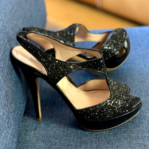 https://trendful.com/products/miu-miu-black-sequin-platform-pumps?_pos=1&_sid=fb33e8b22&_ss=r