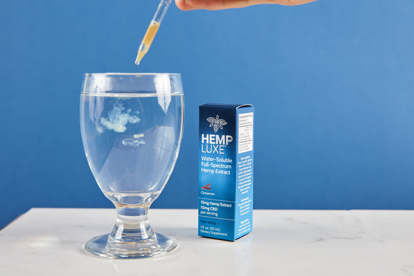Water based full spectrum hemp extract CBD dissolving into drink
