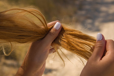 Brittle hair and nails are a sign of dehydration