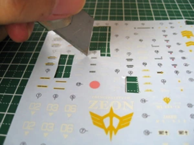 cutting out a decal