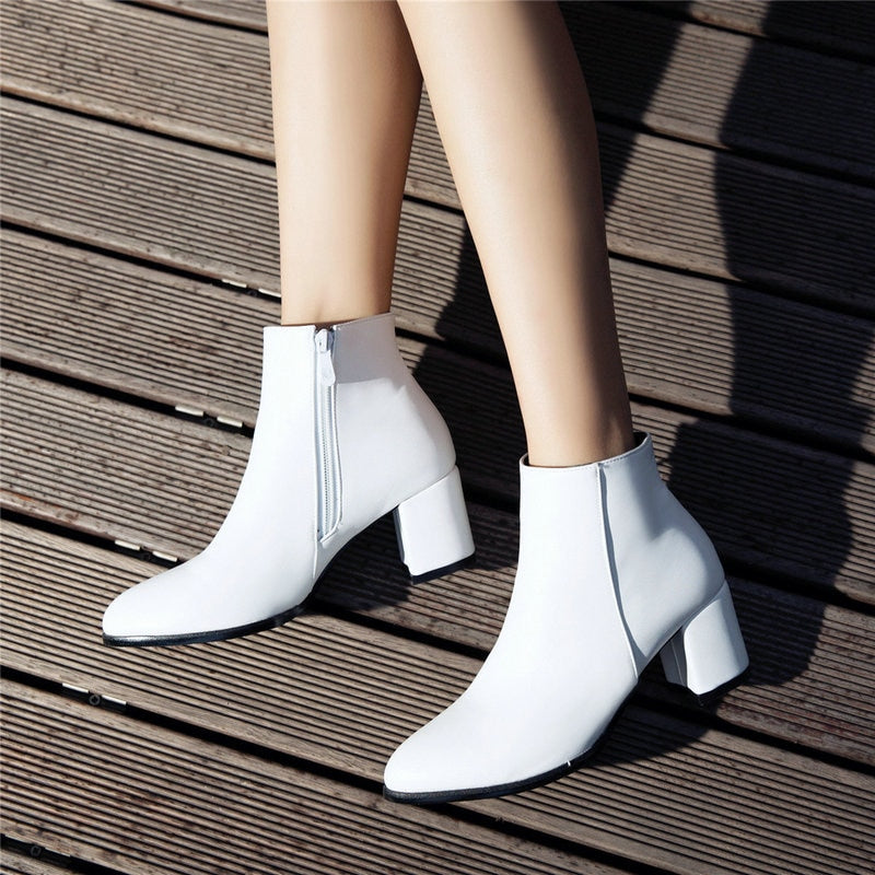 white 60s ankle boots