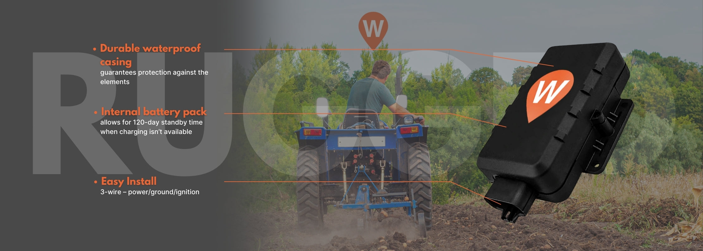 Compact tractor driving through a field rugged GPS tracker with device features