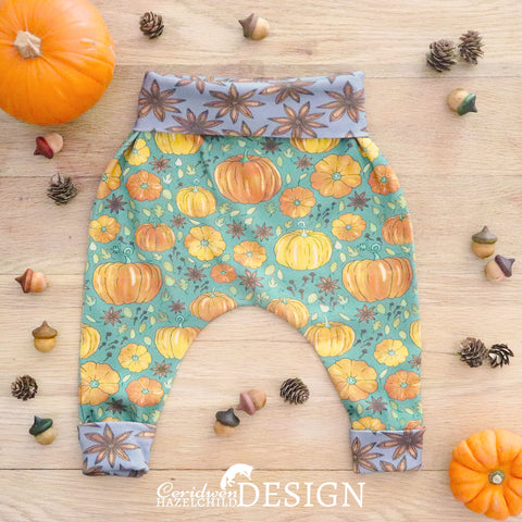 Handmade baby leggings made from organic cotton jersery printed with Ceridwen Hazelchild's Pumpkin Spice pattern and Star Anise cuffs.