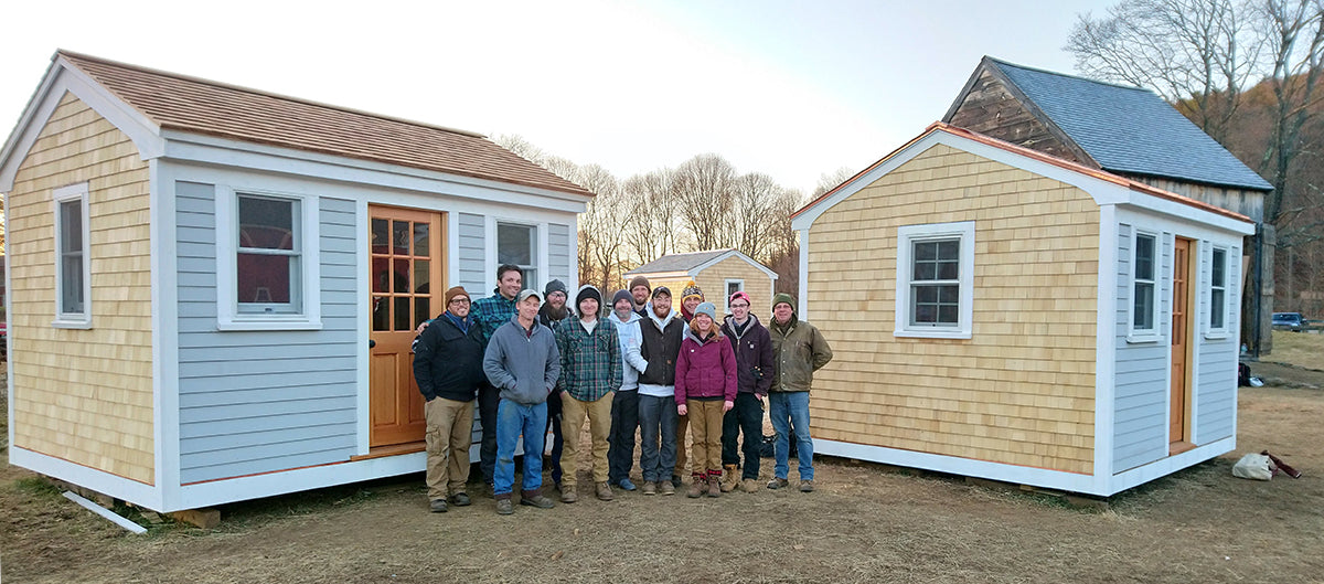 Students in front of finished sheds