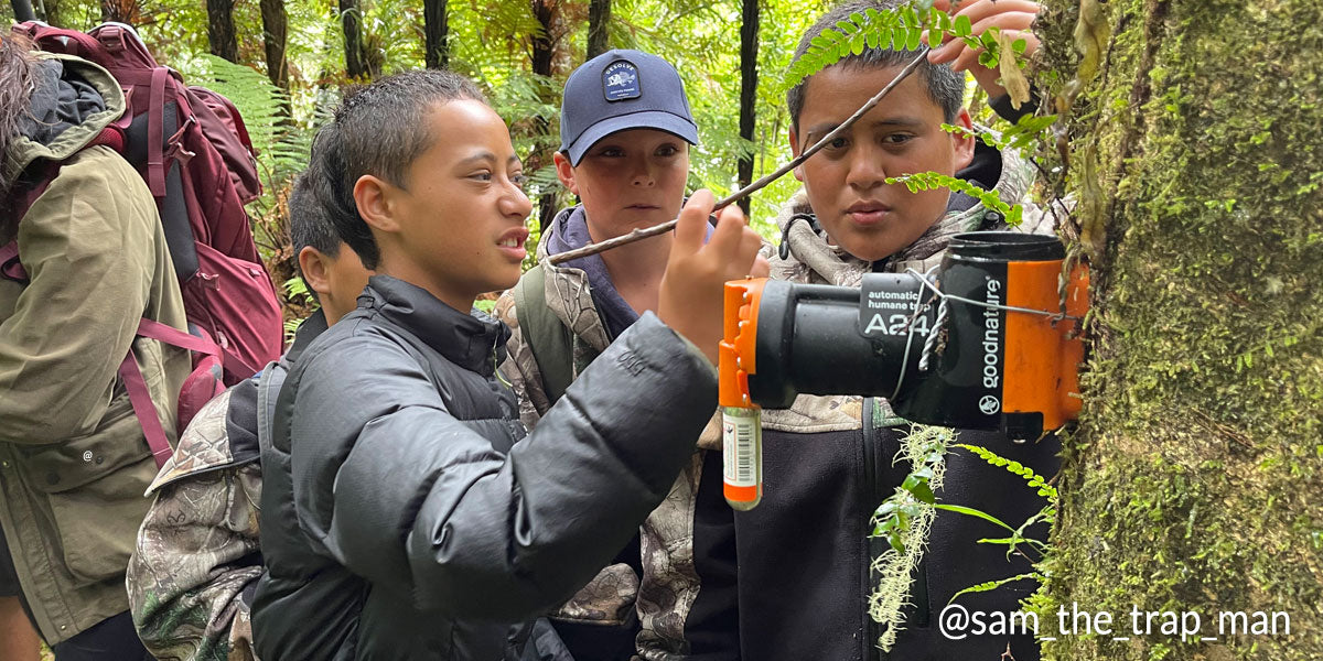 kids installing Goodnature A24 Trap