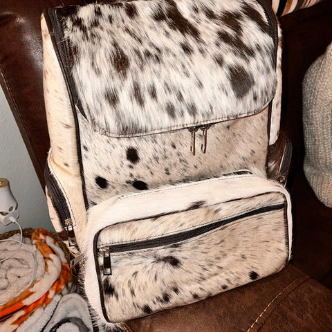 Upgrade your style game with our chic cowhide backpacks. Unleash your personal taste and make a fashion statement.