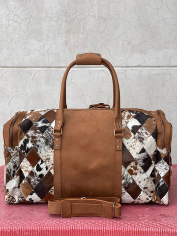 Cowhide duffle bags