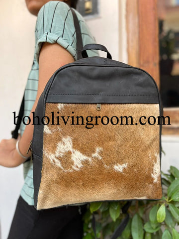 Unleash your style with our fashionable and functional cowhide backpacks. Find the perfect accessory to express yourself.