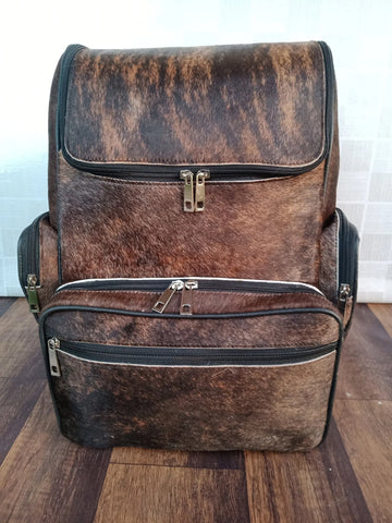 Discover the ultimate statement piece - a stylish cowhide backpack that lets you stand out from the crowd. Dare to be different today!