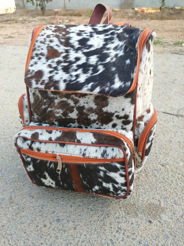 Elevate your fashion game with our trendy cowhide backpack. Dare to be different and show off your individuality in style.