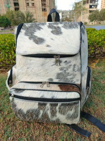 Elevate your fashion game with our trendy cowhide backpack. Dare to be different and show off your individuality in style.