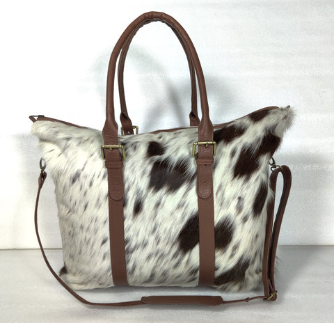 Get ready to turn heads with our stunning designer cowhide handbags. Explore our wide range of fashionable and high-quality options.