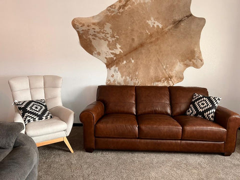 Transform your space with stunning natural cowhide rugs on the wall. Add a touch of rustic elegance to any room.