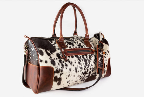 Shop the latest collection of designer cowhide handbags. Find unique and stylish options for every fashionista.