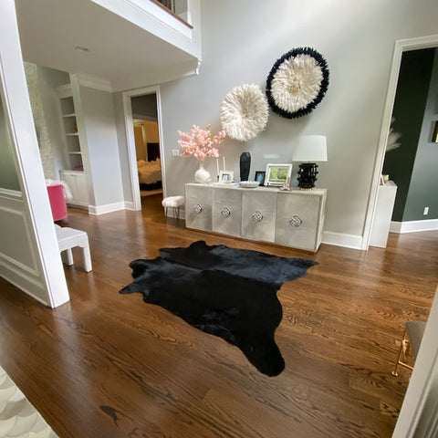 Enhance your home with luxurious cowhide rugs in USA. Experience the beauty and versatility of natural hide floor coverings.