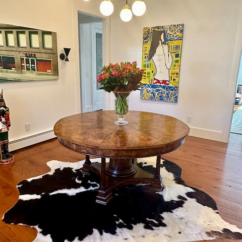 Elevate your space with stunning cowhide rugs. Browse our selection to find the perfect statement piece for any room.
