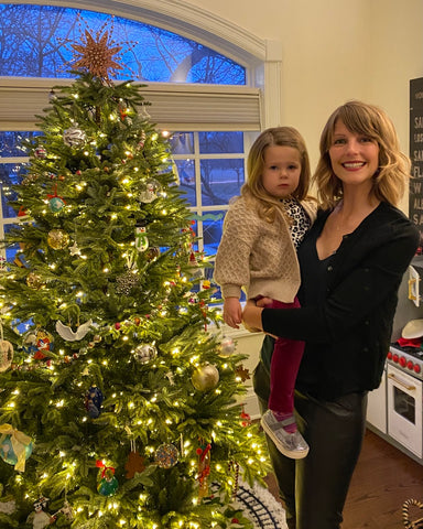 Lauren Lopriore with baby near Christmas tree