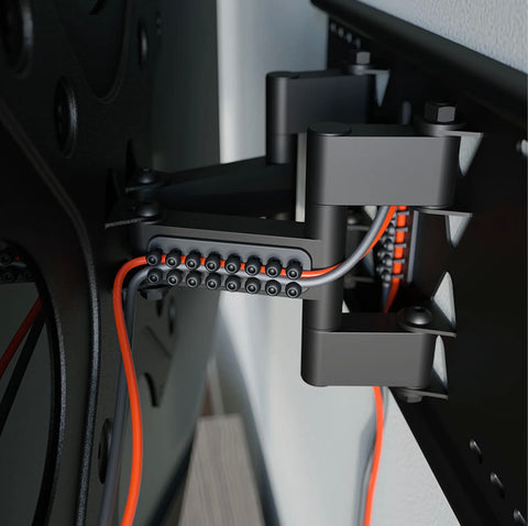 cablox cable organiser with 2 cables threaded through. cablox stuck on a monitor arm