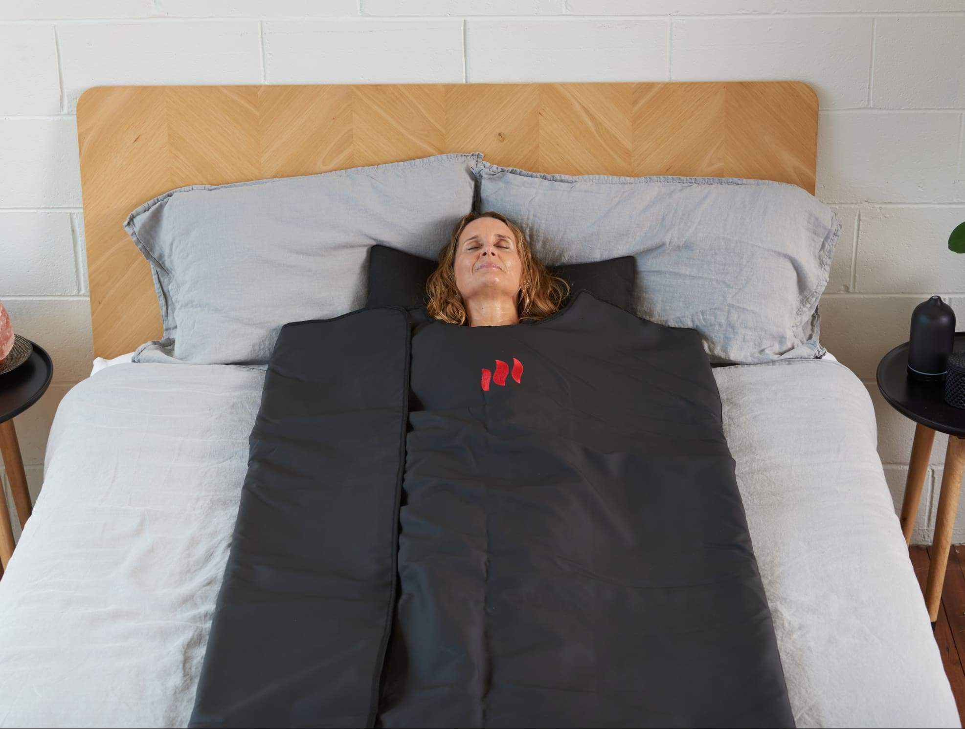 woman in a sauna blanket