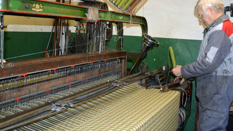 hand shuttle on the loom 